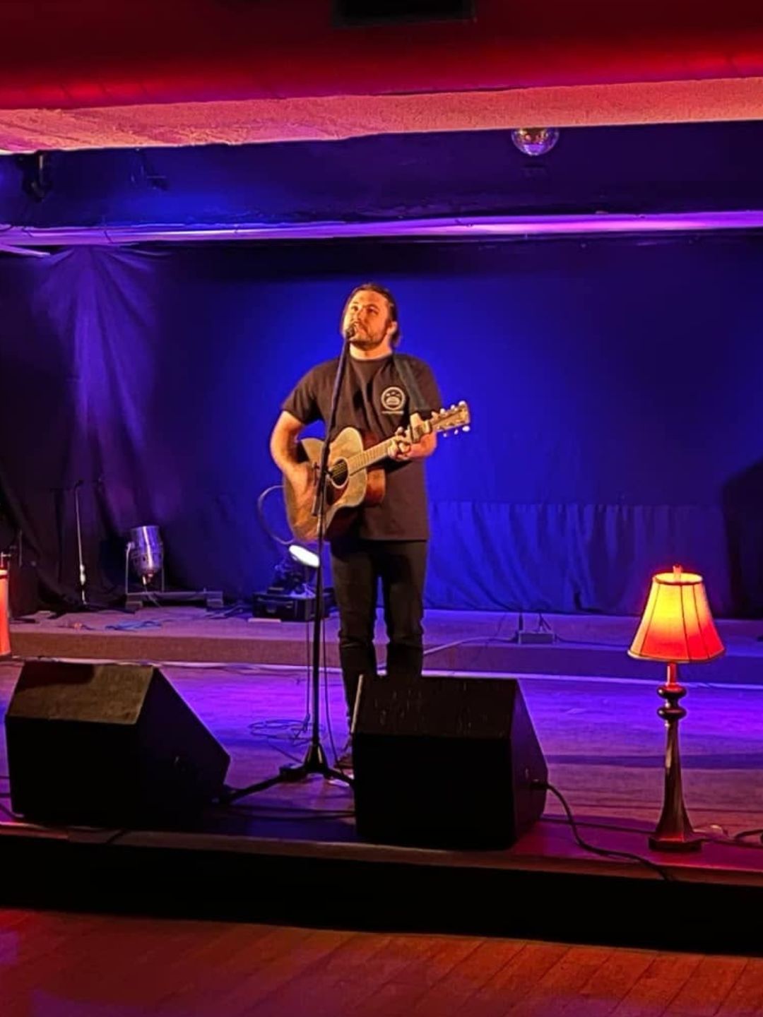 Sean Donley performing live with guitar — photo 1